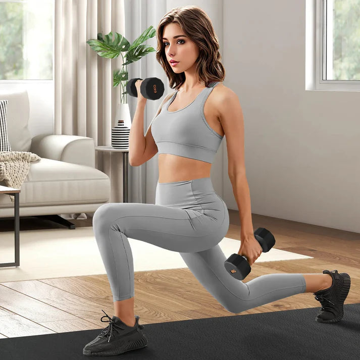 Woman exercising with dumbbells in a modern living room.